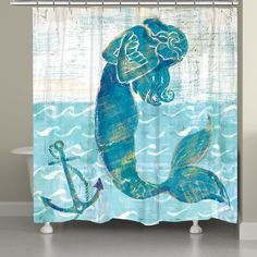 a shower curtain with an image of a mermaid and anchor