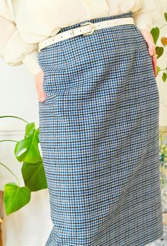 "Wool Skirt, Checked Skirt, Pencil Skirt, Vintage Lambswool. Classic vintage pencil skirt, made by quality clothing label Eastex and dating to the 1980s. This blue checked skirt is a timeless piece of secretary style clothing that is especially great quality and will never go out of style. Made in Great Britain, the fabric is 100% lambswool in blue checked print and fully lined. Flattering fitted pencil shape, sitting just below the knee, fastening with a rear zip and button. Looks smart and sty Winter Pencil Skirt With Pockets, Blue Pencil Skirt For Workwear In Fall, Blue Fall Pencil Skirt For Work, Blue Winter Skirt Bottoms, Blue Pencil Skirt For Fall, High-waist Blue Skirt For Winter, Blue Long Skirt For Winter, High Waist Blue Skirt For Winter, Blue High-waisted Winter Skirt