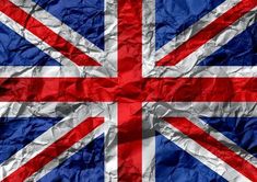 the british flag is shown on crumpled paper