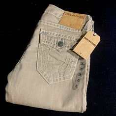 Rare! Brand New With Tags! Ricky Straight Khaki Colored Denim Supert In “Bma Khk Cldo Trl” Size 32x33 Waist Measures 16 1/2” Across Laying Flat With A 33 1/2” Inseam Unaltered And 8” Leg Opening Beautiful Tonal Super T Stitching Throughout The Jean With Contrasting Grey Accents/Bar Tacks And Antiqued Hardware! Suede Leather Tr Logo Back Patch This Is A Grail Pair Of Mine From Between 2012-2014 When True Religion Released A Limited Edition Military Capsule Collection! Insanely Rare To Find Nwt’s Designer Fitted Cotton Jeans, Designer Cotton Jeans, Khaki Denim Cargo Jeans, True Religion Jeans Men, Billy Jean, Blue Y2k, True Religion Men, Relaxed Jeans, Denim Jeans Men