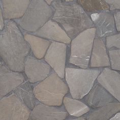 an image of a stone wall that looks like it is made out of rocks