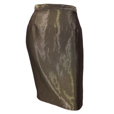 Chic 1990s GIANFRANCO FERRE metllaic bronze / golden high waisted pencil skirt! The perfect pairing for a basic black or white blouse. Skirt is even prettier in person, and looks like liquid silk. Hidden zipper up the back with button closure. Fully lined. Luxurious silk / rayon fabric blend. The pictured vintage Jean Paul Gaultier black crop top is also available in my 1stDibs Shop. In great condition. Made in Italy Marked Size 44 / US 8 Measurements: 30 inch waist 38-40 inch hips 20.5 inches i 1960’s Fashion, White Linen Skirt, High Waist Pencil Skirt, Flamenco Skirt, Stacked Heel Boots, Short Black Skirt, Cotton Voile Fabric, Designer Skirts, Textured Skirt