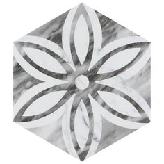 a marble hexagonal with an intricate flower design