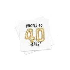 cheers to 40 years gold foil balloon sticker on white paper with the words cheers to 40 years printed on it