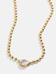 Elevate your everyday glam with our Kaycee Necklace. A contemporary piece that seamlessly blends the chic warmth of gold with the dazzle of Cubic Zirconia, ensuring you stand out effortlessly from day to night. Make a modern statement and redefine your style with this versatile and sparkling accessory. Jewish Star Necklace, Gold Birthstone Necklace, Gold Chain Necklaces, 14k Gold Initial Necklace, Gold Medallion Necklace, Gold Beaded Necklace, Everyday Glam, Custom Initial Necklace, 18k Gold Necklace