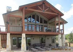 a large house with lots of windows on the side