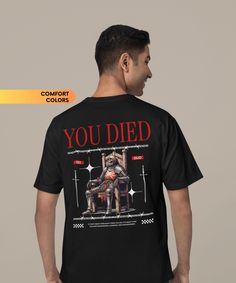 a man wearing a black t - shirt with the words you died on it