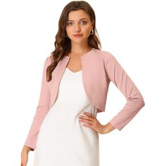 A good shrug is essential to every woman's wardrobe. Warm enough to wear on its own to keep your arms and upper back covered. The long-sleeve shrugs are also great if you have a sleeveless dress or a cute sleeveless shirt. It's darted at the bust to create a shapely figure, while the curved front at the back creates an elegant and stylish silhouette. Long Sleeve Shrug, Cropped Shrug, Shrug For Dresses, Bolero Shrug, Shrug Cardigan, Women's Wardrobe, Cropped Cardigan, Sleeveless Shirt, Crop Jacket