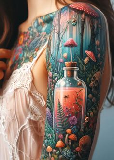 a woman's arm with an image of mushrooms in a bottle and flowers on it