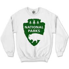 Take a hike in this crew neck, fleece sweatshirt featuring our own take on the National Parks Service logo. Hank Player is proudly designed and crafted in Los Angeles, California with the finest quality materials. Our super-soft fleece will have a weathered, worn-in feel after the first wash. Slight variations in color and print create Hank Player’s one-of-a-kind look. This item is a unisex style, please order one size smaller for a women’s fit. Sporty Crew Neck T-shirt For Outdoor, Graphic Print Crew Neck T-shirt For Theme Park, National Parks Sweatshirt, National Parks Tshirt, Sporty Crew Neck T-shirt For Hiking, Service Logo, Take A Hike, National Park Service, Muscle Tees