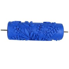 a blue plastic object with flowers on it