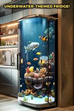 an underwater themed fridge in the middle of a kitchen with fish and corals on it