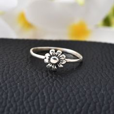 Stamped 925 Flower Jewelry, Silver Flower Charm Ring For Wedding, Dainty Sterling Silver Flower Shaped Rings, Sterling Silver Flower Ring For Wedding, Flower Shaped Hallmarked Rings For Anniversary, Hallmarked Flower Ring For Anniversary, Fine Jewelry Hallmarked Flower Ring, Flower Shaped Hallmarked Anniversary Ring, Anniversary Flower Ring Hallmarked