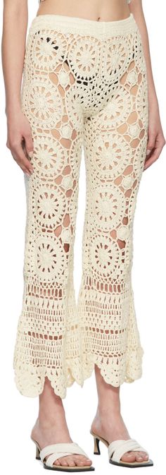 Open hand-crocheted cotton lounge pants. · Elasticized waistband · Flared cuffs Supplier color: Off-White Crochet Pants, Open Hands, Crochet Dresses, Lounge Pants, Leg Warmers, Crochet Dress, Hand Crochet, White Cotton, Knit Crochet