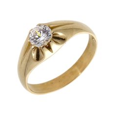 a yellow gold ring with a diamond in the center