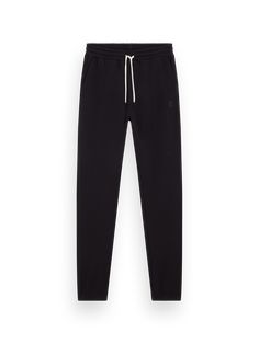 Elevate your casual look with our Essential Logo Sweatpants. Made from 100% cotton, these sweatpants feature a classic closed bottom with elastic around the hem to maintain a snug fit at your ankles and legs. Whether you're hitting the gym or relaxing at home, these sweatpants provide both comfort and style. 100% Cotton Wash - 30 Degrees Normal Classic Sweatpants With Elastic Waistband For Loungewear, Classic Relaxed Fit Sweatpants, Classic Straight Leg Sweatpants With Elastic Waistband, Basic Stretch Sweatpants With Ribbed Waistband, Stretch Sweatpants With Ribbed Cuffs For Everyday, Sporty Sweatpants With Elastic Cuffs For Everyday, Sporty Everyday Pants With Ribbed Cuffs, Basic Everyday Sweatpants With Elastic Waistband, Jogging Sweatpants With Ribbed Cuffs And Tapered Leg