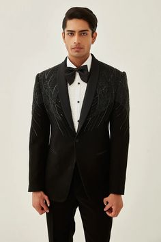 Designer Menswear Tuxedo For Men Color-Black Colors can be customized as per clients needs as well FABRIC ALL SEASON SUITING MATERIAL PATTERN EMBROIDERED CARE DRY CLEAN ONLY ITEMS INCLUDED SHIRT, JACKET, PANTS, BOW SHOE NOT INCLUDED, ALTHOUGH CAN BE CUSTOMIZED IF THE CLIENT NEEDS (DROP US A MESSAGE IN CASE THERE IS ANY CONFUSION IN THE MEASUREMENTS) Fancy Tuxedo For Men, Tailored Embroidered Tuxedo For Groom, Embroidered Fitted Tuxedo For Groom, Tailored Tuxedo Style Bandhgala For Wedding, Festive Fitted Suit For Groom, Embroidered Fitted Suit For Groom, Embroidered Fitted Suits For Groom, Festive Embroidered Tuxedo For Grooms, Designer Tuxedo For Groom, Festive Occasion