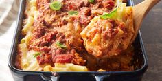 a casserole dish with meat and cheese in it, ready to be eaten