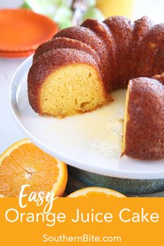 an orange juice cake on a white plate