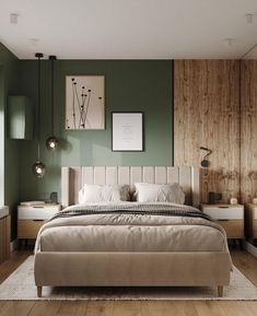 a bedroom with green walls and white furniture in the corner, including a large bed