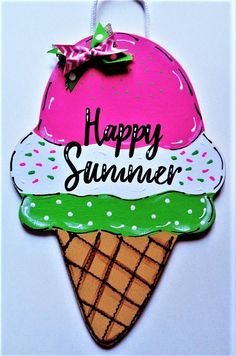 an ice cream sundae hanging ornament with the words happy summer on it