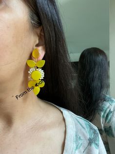 Contemporary looking long earrings with semi precious stones like rose quartz and onyx. These stones are set on brass base and gold plating. The small gajra pearls are strung to add the extra charm. These are super lightweight and chic pieces. One of a kind and treat to eyes. Elegant Yellow Flower Earrings For Summer, Yellow Drop Earrings, Trendy Yellow Flower Earrings For Party, Modern Yellow Earrings For Party, Yellow Danglers As A Gift, Yellow Trendy Flower Earrings For Party, Yellow Flower Drop Earrings For Party, Elegant Yellow Drop Earrings, Elegant Yellow Earrings With Natural Stones