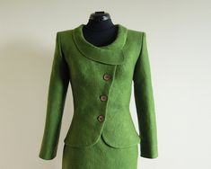 Felted Jacket for Women, Green Short Coat, Asymmetrical Jacket Ideal green wool jacket for spring time. Greenery felted jacket fits you well for skirt or jeans. Asymmetrical jacket is felted from extra fine Merino wool. You will feel very comfortable due to wool quality and characteristics: This item keeps you warm and has good breathability. Spring must have ! Materials: Merino wool, wooden buttons. Size: 34-40 EU. More jackets: https://www.etsy.com/shop/DressInFelt?section_id=12416030&ref= Wedding Dress Jacket, Minimalist Jacket, Asymmetrical Jacket, Green Jacket Women, Jacket For Spring, Jacket Collar, Elegant Jacket, Asymmetric Jacket, Bridal Jacket