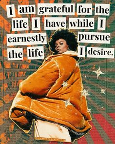 a woman in an orange coat with words on it