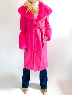 Embrace your playful side with our Faux Leather Trench Coat with Faux Fur Trim. This coat features exaggerated lapels and large cuffs for a touch of drama, while the belted waistline creates a flattering silhouette. Available in striking Hot Pink, this faux leather trench coat offers a fun contrast to traditional fall and winter colors. The unexpected and eye-catching color choice, combined with the playful design elements, makes this coat perfect for those who want to show off their unique styl Faux Leather Trench Coat, Midi Dress Formal, Leather Trench, Pink Coat, Leather Trench Coat, Mini Cocktail Dress, Fall Jackets, Winter Colors, Faux Fur Jacket