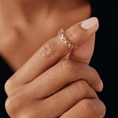 ❧ Product Overview and Key Features  This 14K Solid Gold Heart Band Ring is the perfect expression of affection for a special woman in your life. This dainty stacking heart ring, made with real 14k gold, is a charming and timeless piece. It's an ideal gift, offering a subtle sparkle that complements any outfit. Its durability ensures it can be treasured for a lifetime. Material & Color Options: 14K Yellow Gold, 14K White Gold, 14K Rose Gold  Size Options: 5, 5 ¼, 5 ½, 5 ¾, 6, 6 ¼, 6 ½, 6 ¾, 7, 7 Elegant Heart-shaped Stackable Rings, Elegant Infinity Heart Ring For Promise, Elegant Stackable Rings For Valentine's Day, Elegant Open Band Heart Promise Ring, Diamond Cut Rings For Promise, Delicate Stackable Rings For Valentine's Day, Promise Stackable Eternity Band, Stackable Heart Rings, 14k Gold Heart Ring Fine Jewelry