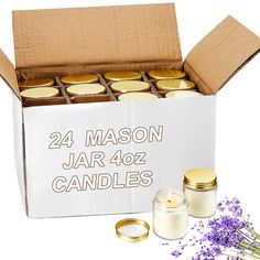 the 24 mason jar candles are packaged in a box and ready to be filled with them