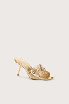 Designed in a Champagne-hued metallic leather, the Giana is an open-toe sandal reimagined. Her shimmering leather cording artfully drapes the top of the foot, while keeping you secure. The angular metal heel adds an additional element of shine to this high-wattage sandal. Apothecary Candles, Bridal Tops, Short Loungewear, Cotton Citizen, Cult Gaia, Goat Leather, Open Toe Sandals, Pretty Shoes, Mens Swimwear