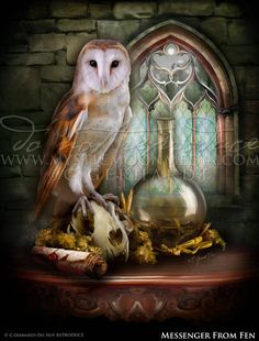 an owl sitting on top of a table next to a vase