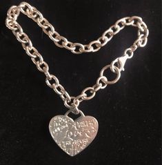 8  1/4" long 925 Silver Bracelet stamped on Heart charm & bracelet chain: 925 LA, 925 Italy. Heart charm is 1" x 1". Written on heart in various fonts are Love, Peaceful, Angel, Live, Courage, Hug, Treasure & XOXO. 925 Silver Bracelet, Bracelet Chain, Heart Charm Bracelet, Charm Bracelets, Silver Heart, Heart Charm, 925 Silver, Silver Bracelet, Beauty Book