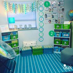 the room is decorated in blue and green with pictures on the wall, bookshelves, and toy bins