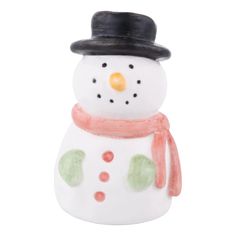 a white snowman with a black hat and scarf