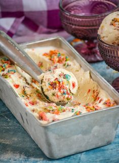 ice cream with sprinkles in a metal container