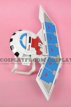 a paper model of a space ship with its door open and red arrow pointing towards it