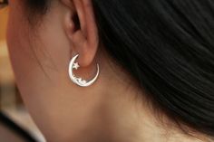 Crescent cz Moon earrings, Delicate sterling silver half moon earrings, Celestial earrings This jewel is a treasure keeper so as to keep you safe and sound... Celestial earrings with attention to detail with a tiny star with a cz stone set in it. Designed, sculptured, cast and finished in our beautiful studio in sunny Greece! ♥ You can wear this jewel with this ring: https://www.etsy.com/listing/820065274/moon-ring-crescent-moon-ring-delicate?ref=shop_home_feat_2&pro=1&frs=1 D E T A I L Sterling Silver Moon Charm Earrings For Anniversary, Sterling Silver Half Moon Single Earring, Celestial Hoop Sterling Silver Earrings, Sterling Silver Celestial Hoop Earrings, Silver Half Moon Hoop Earrings For Gift, Silver Sterling Silver Celestial Hoop Earrings, Moon Shaped Sterling Silver Earrings For Everyday, Sterling Silver Celestial Earrings For Everyday, Sterling Silver Moon Earrings For Everyday