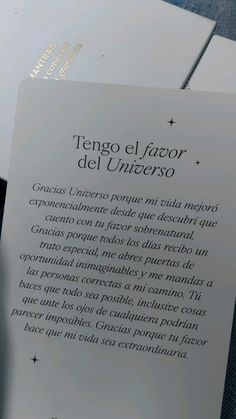 an open book with spanish writing on it