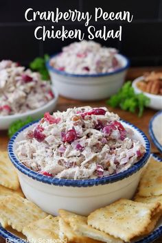 Two small white bowls filled with cranberry chicken salad on a plate with crackers lined around the bowl. Cranberry Pecan Chicken Salad, Walnut Chicken Salad, Homemade Chicken Salads, Walnut Chicken, Leftover Chicken Breast, Cranberry Chicken Salad, Pecan Chicken Salads, Rotisserie Chicken Breast, Cranberry Chicken