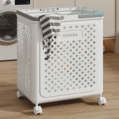 a laundry basket sitting on top of a wooden floor