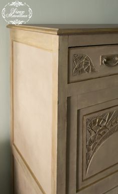 an old dresser with ornate carvings on it