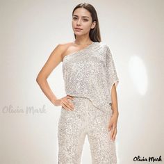 Olivia Mark - Sleeveless One-Shoulder Jumpsuit with Shimmering Sequins Embellishment Glamorous Off-shoulder Jumpsuits And Rompers For Party, Sequin Strapless Sleeveless Jumpsuit For Party, Glamorous One-shoulder Summer Jumpsuits And Rompers, Glamorous One-shoulder Jumpsuits And Rompers For Summer, Glamorous Strapless Sleeveless Jumpsuit For Party Season, Sequin Strapless Jumpsuit For Party, Glamorous One-shoulder Summer Jumpsuit, Glamorous One-shoulder Jumpsuits And Rompers For Party, One Shoulder Jumpsuit For Summer Party