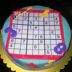 a birthday cake with a sud puzzle on it