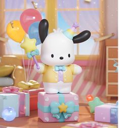 a small toy rabbit with balloons and stars on it's head sitting on top of a gift box