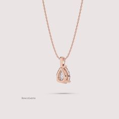 Elevate your style with our Lab Grown 1 Carat Pear Solitaire Diamond Pendant, expertly crafted in radiant 14K rose gold. This exquisite pendant features a dazzling pear-cut lab-grown diamond, exuding timeless beauty and sophistication. Perfect for any occasion, this pendant adds a touch of elegance and glamour to your look. ✤𝐃𝐢𝐚𝐦𝐨𝐧𝐝 𝐃𝐞𝐭𝐚𝐢𝐥𝐬 Color: F Clarity: VS1 Shape: Pear Cut Carat Weight: 1 CT Approx. Type: Lab Diamond ✤Metal 𝐃𝐞𝐭𝐚𝐢𝐥𝐬 Metal Purity: Solid 14K Gold Metal Tone: Yellow, White, Rose Stamp/Hallmark: Yes Jewelry Certificate: Free of Cost with Listed Design Chain Length: 16″ inch Pear-shaped Brilliant Cut Rose Gold Jewelry, Pear-shaped Rose Gold Jewelry With Brilliant Cut, Rose Gold Teardrop Pendant With Brilliant Cut, Rose Gold Pear-shaped Jewelry With Prong Setting, Jewelry Certificate, Solitaire Diamond Pendant, Solitaire Diamond, Pear Cut, 1 Carat