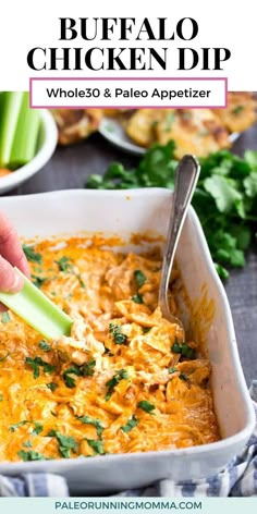 buffalo chicken dip in a white casserole dish