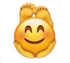 an emoticive smiley face with two hands on it's chest and eyes closed