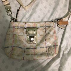 Never Used, Perfect Condition. White Shoulder Bag Pouch With Cell Phone Pocket, Coach Cream Pouch Shoulder Bag, Coach White Pouch Shoulder Bag, White Coach Pouch Shoulder Bag, Coach White Travel Shoulder Bag, Coach White Shoulder Bag For Travel, White Coach Shoulder Bag For Travel, White Crossbody Bag With Zipper Closure, Cream Coach Shoulder Bag With Zipper Closure